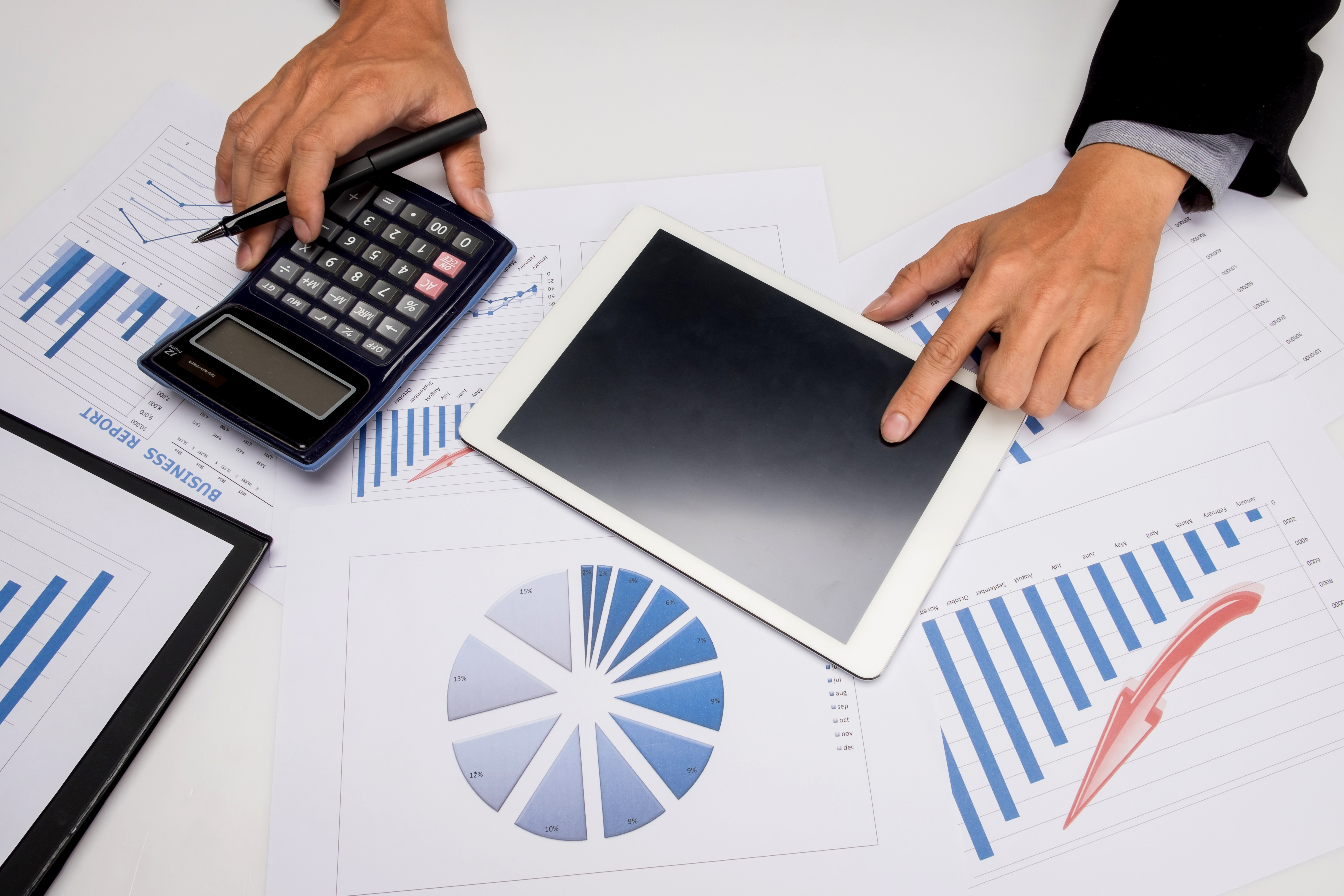 business documents on office table with smart phone and digital